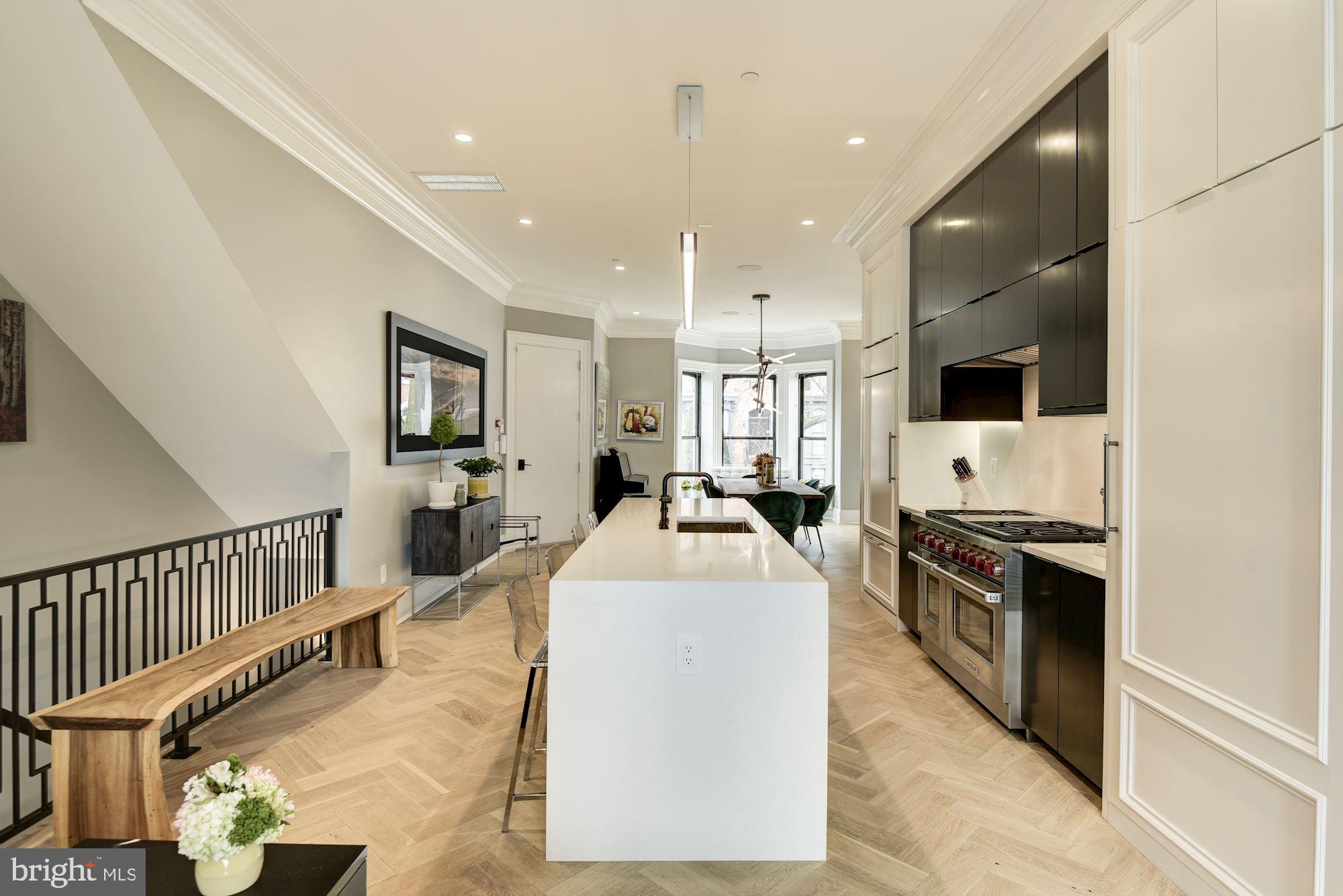 1313 R Street Northwest, Unit 1 Washington, DC 20009 - Photo 11 of 36 Kitchen leads to family room and dining