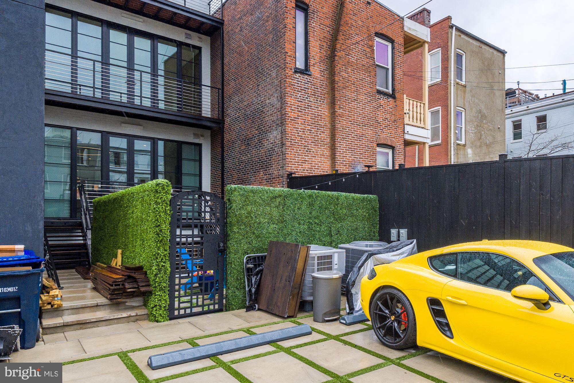 1313 R Street Northwest, Unit 1 Washington, DC 20009 - Photo 33 of 36 Parking spot with garage door