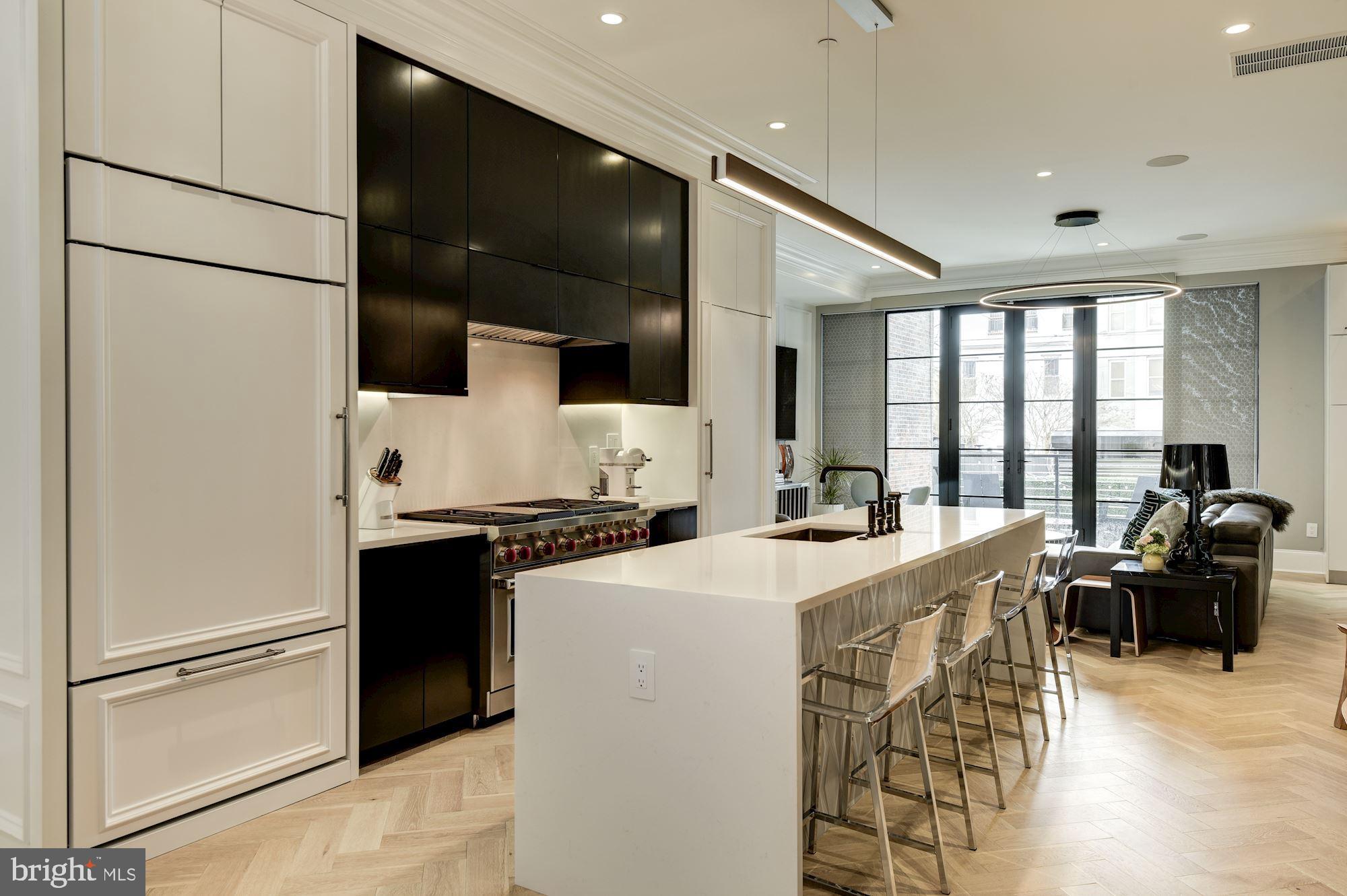 1313 R Street Northwest, Unit 1 Washington, DC 20009 - Photo 8 of 36 Waterfall countertops over large center isle