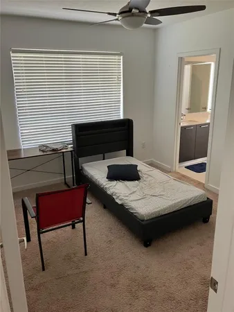 a bathroom with a toilet a sink and bathtub