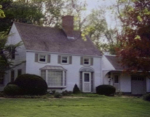 22 McGregory Road Sturbridge, MA 01566 - Photo 1 of 1 a large tree in front of a house