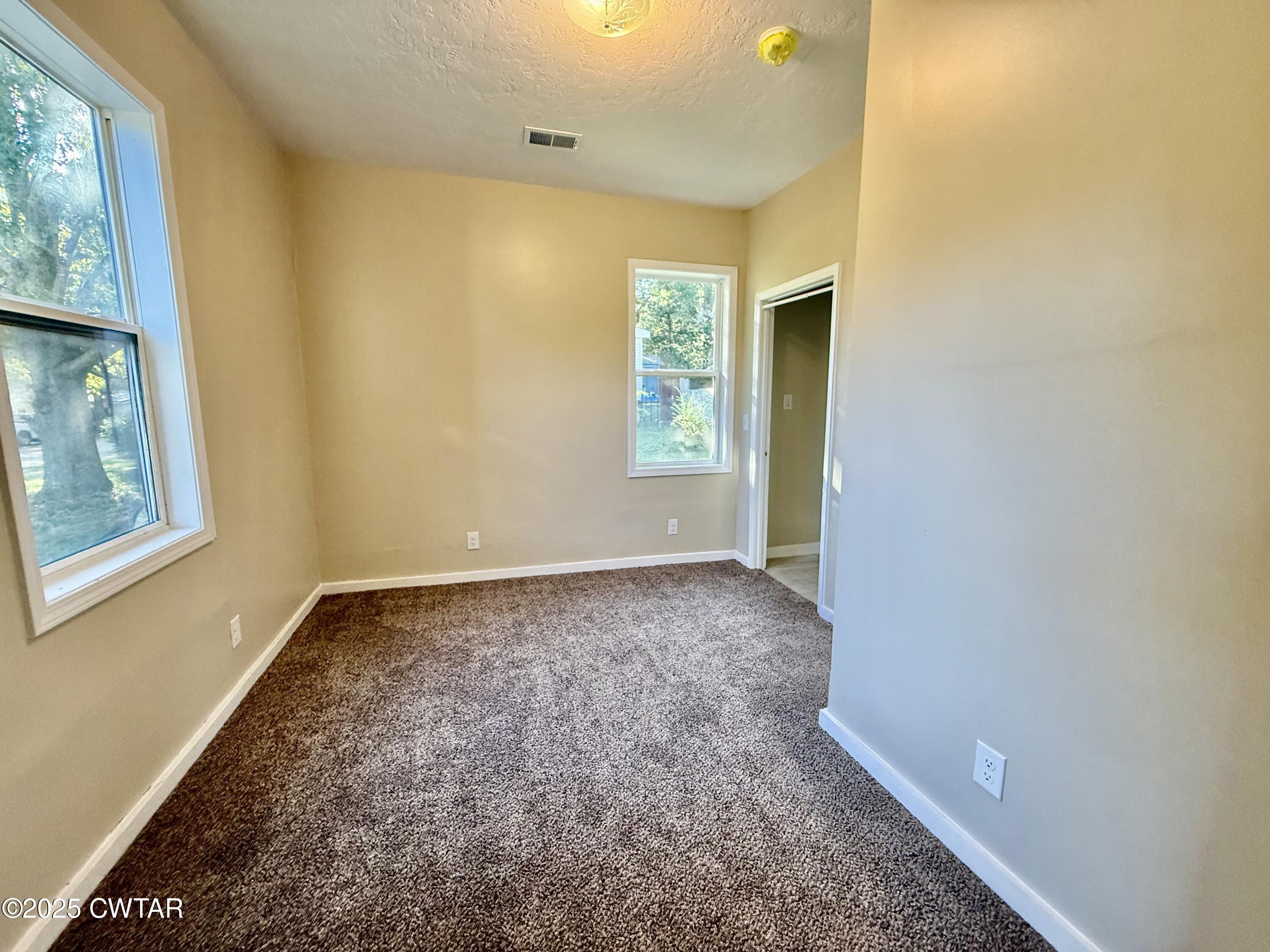 609 West Westbrook St Extension Troy, TN 38260 - Photo 10 of 16 a view of an empty room and window