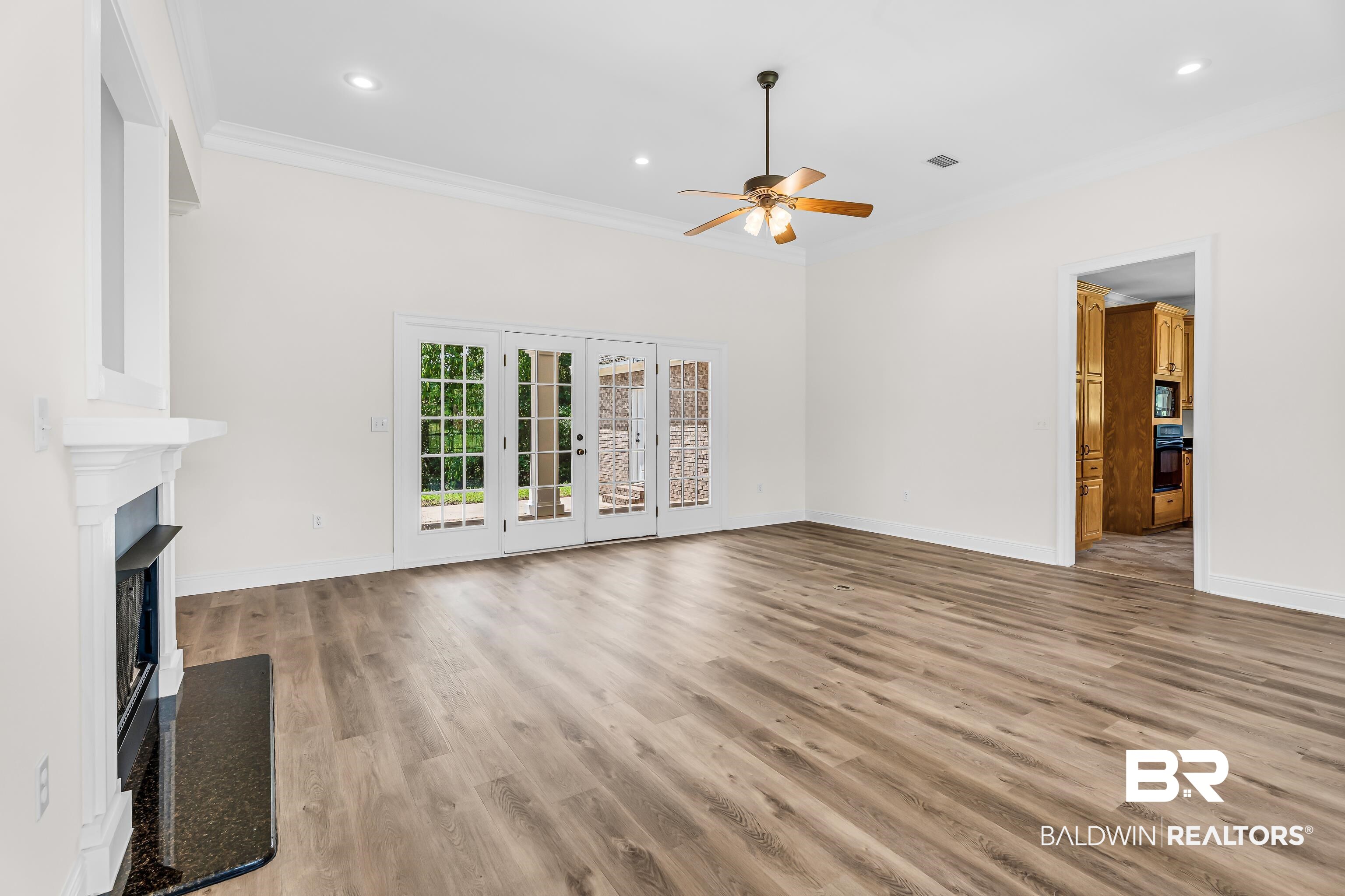7495 Bromley Road Bay Minette, AL 36507 - Photo 11 of 31 Greatroom looking towards back yard porch