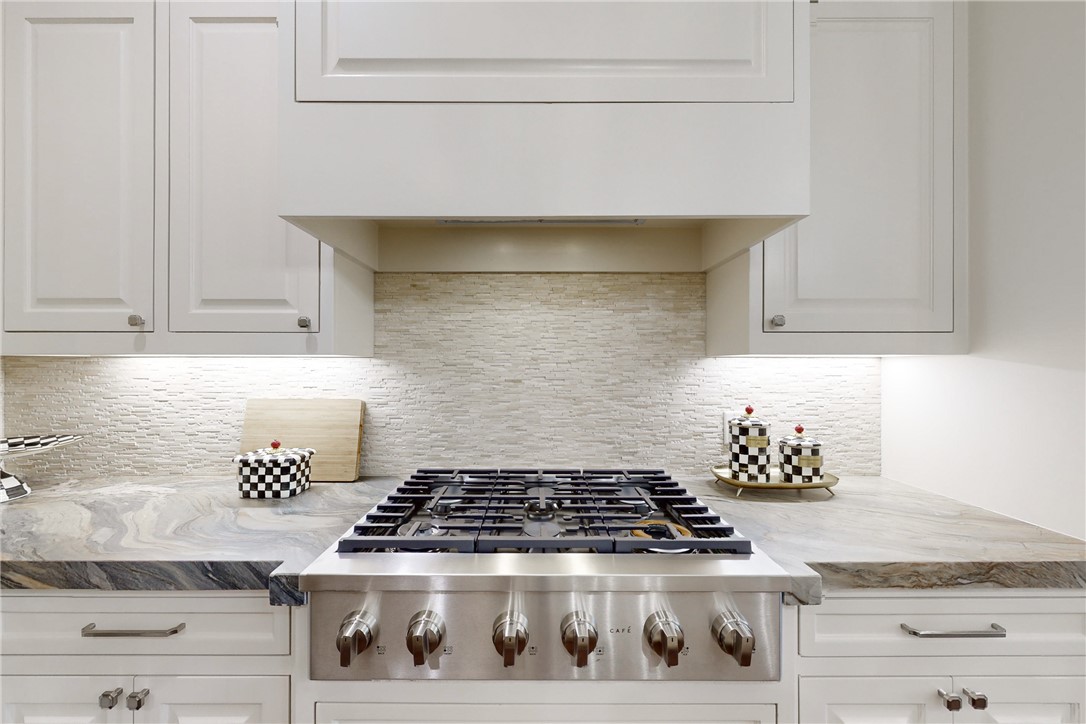 3317 Legacy Court Bryan, TX 77802 - Photo 6 of 28 a stove top oven sitting inside of a kitchen