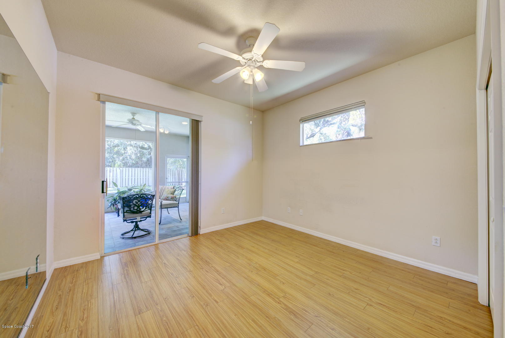 970 Spring Oak Drive Melbourne, FL 32901 - Photo 16 of 43 Bedroom 3 access to Sunroom