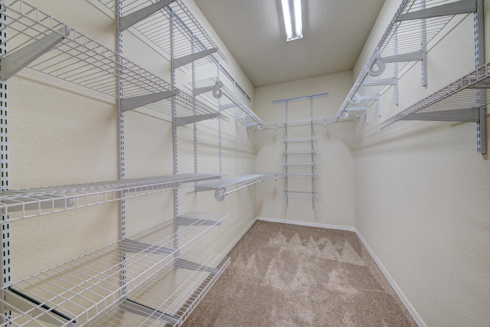 970 Spring Oak Drive Melbourne, FL 32901 - Photo 24 of 43 Master Walk-in Closet