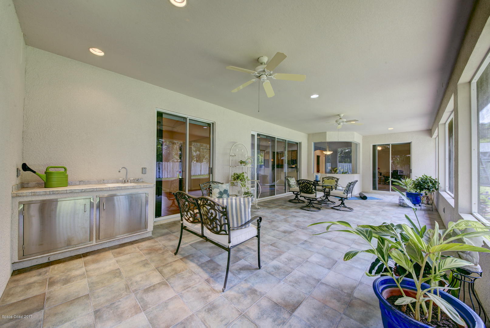 970 Spring Oak Drive Melbourne, FL 32901 - Photo 37 of 43 Sunroom with Utility Sink