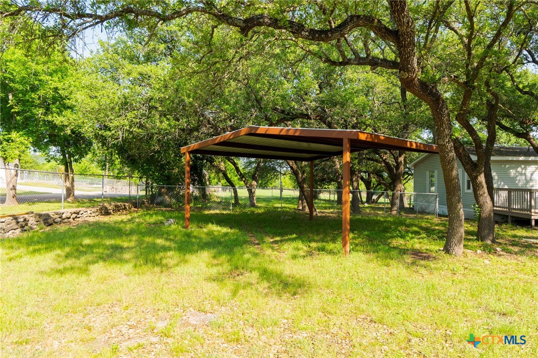 2739 Willow Loop Kempner, TX 76539 - Photo 29 of 30 a backyard of a house with table and chairs