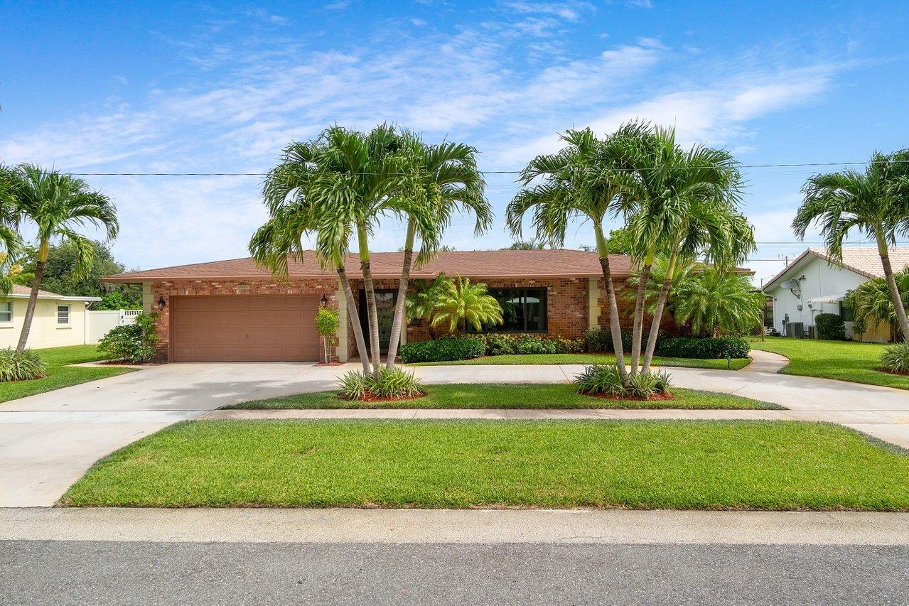 1521 Northwest 7th Street Boca Raton, FL 33486 - Photo 1 of 22 002-1521Northwest7thStreet-BocaRaton-FL-