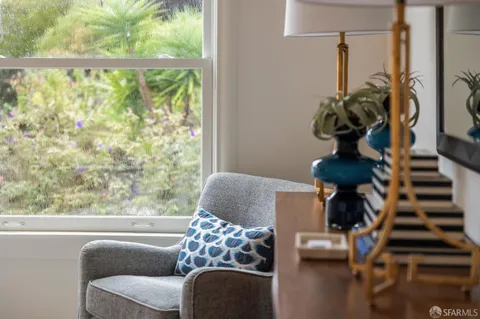 a view of balcony with furniture
