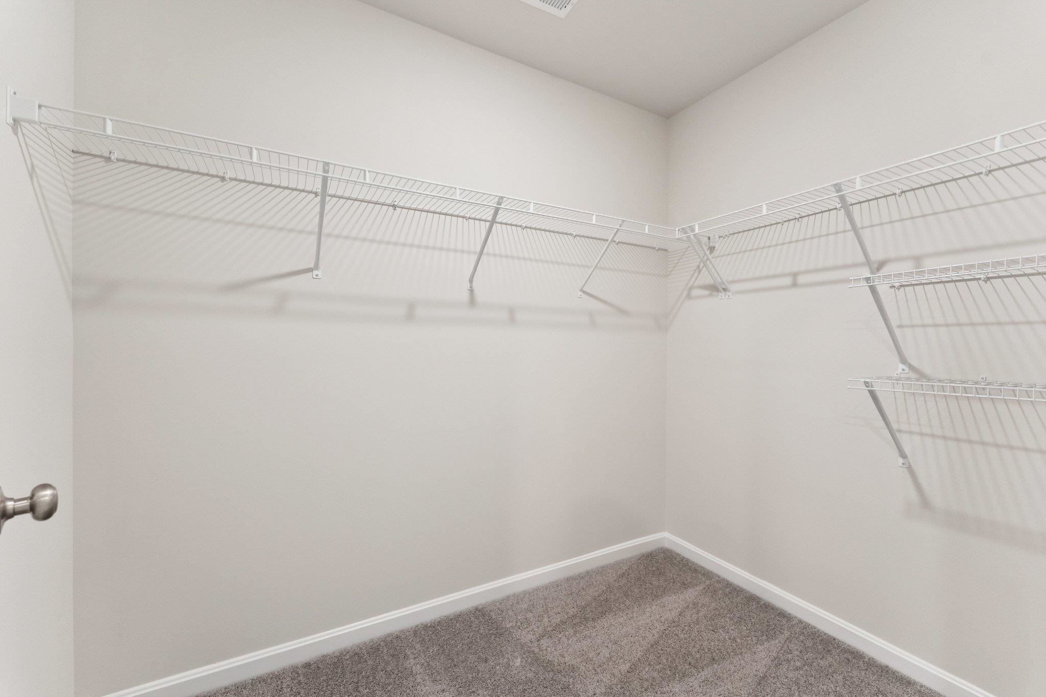 112 Meadow Ridge Way Staunton, VA 24401 - Photo 15 of 33 a view of a room with racks on the wall