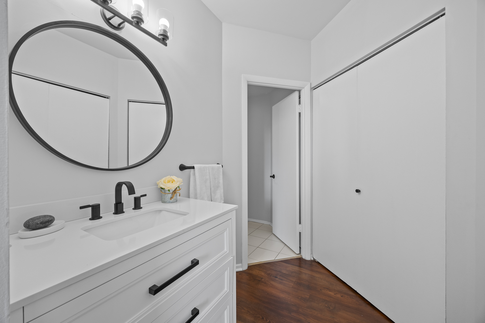 740 South Federal Street, Unit 710 Chicago, IL 60605 - Photo 15 of 23 a bathroom with a sink and a mirror