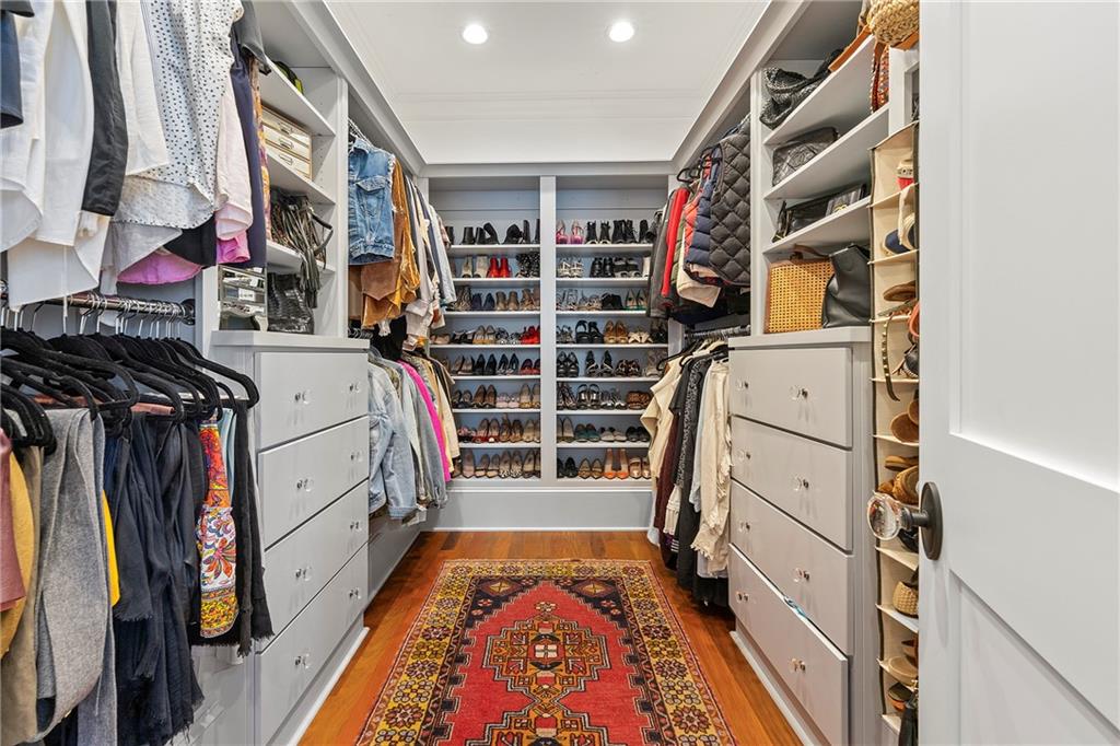 612 Fortune Place Northeast Atlanta, GA 30312 - Photo 29 of 48 a view of walk in closet with clothes and shoes