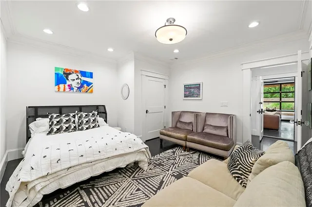 a bedroom with furniture and a couch