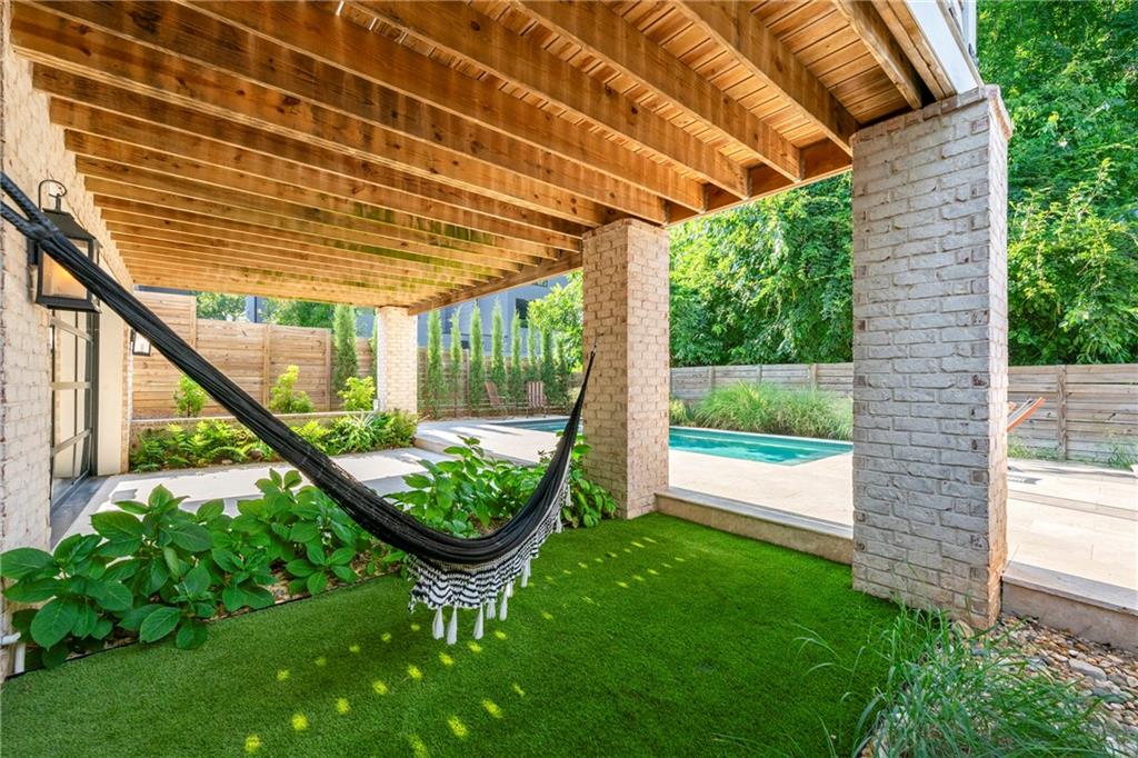 612 Fortune Place Northeast Atlanta, GA 30312 - Photo 38 of 48 a view of a chair in the patio with a backyard