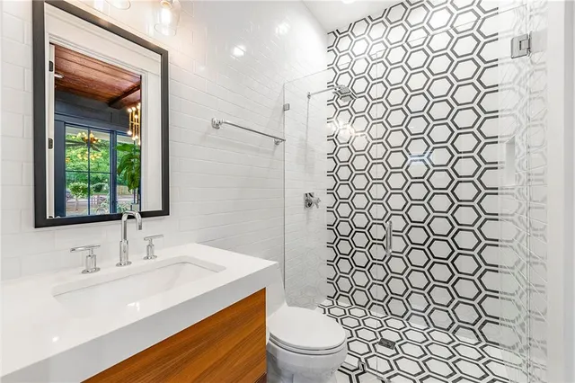 a bathroom with a sink and a toilet