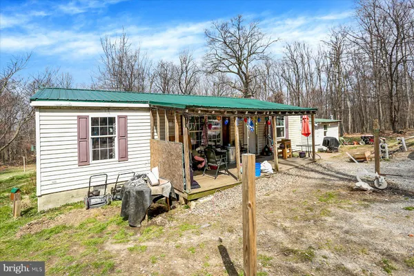 a view of a lounge chairs in the roof deck
