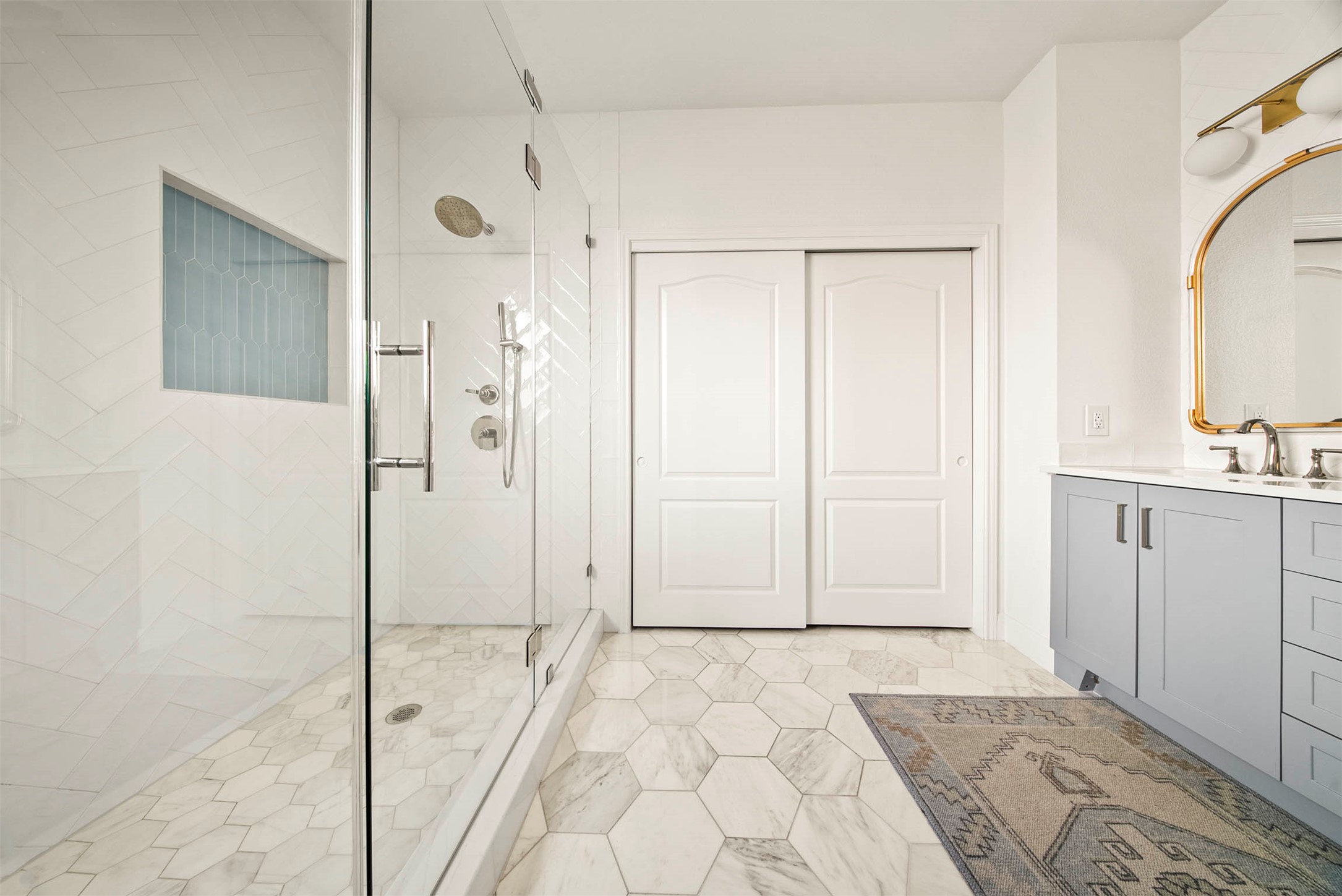 6720 Hansa Loop Austin, TX 78739 - Photo 21 of 38 The primary bathroom offers a dual vanity with plenty of storage and a spa-like feel