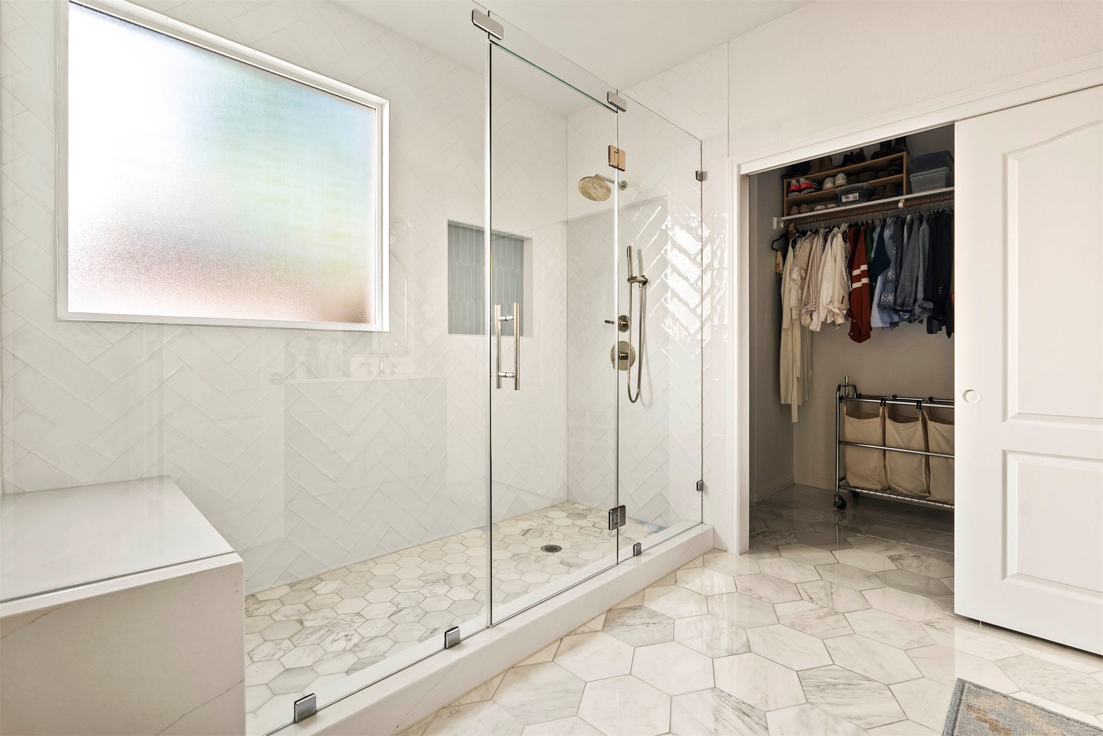 6720 Hansa Loop Austin, TX 78739 - Photo 24 of 38 This primary bath layout prioritizes both space and flow for a smooth morning routine