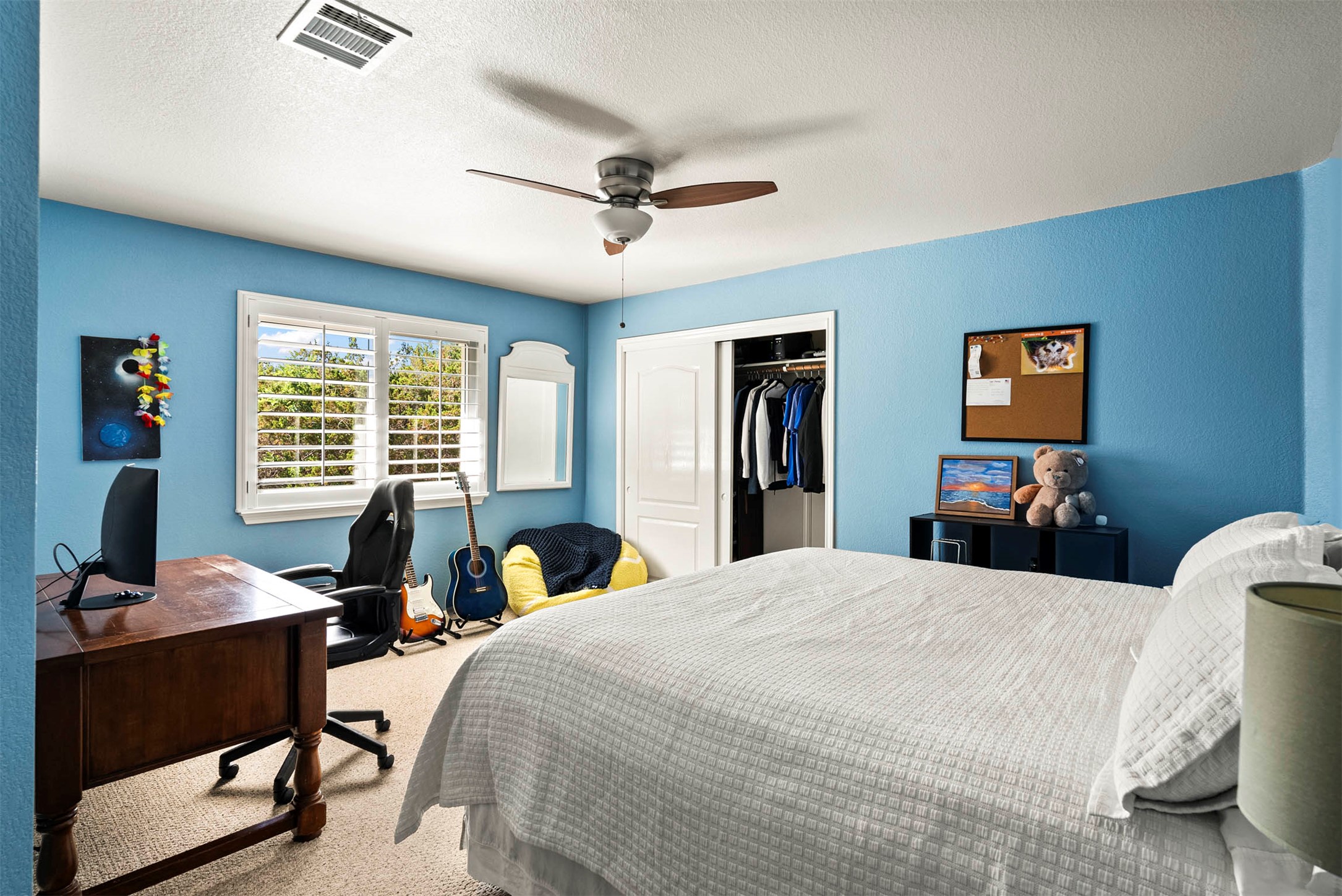 6720 Hansa Loop Austin, TX 78739 - Photo 28 of 38 The upstairs bedrooms share a sense of quiet, being tucked away from the main-floor social areas