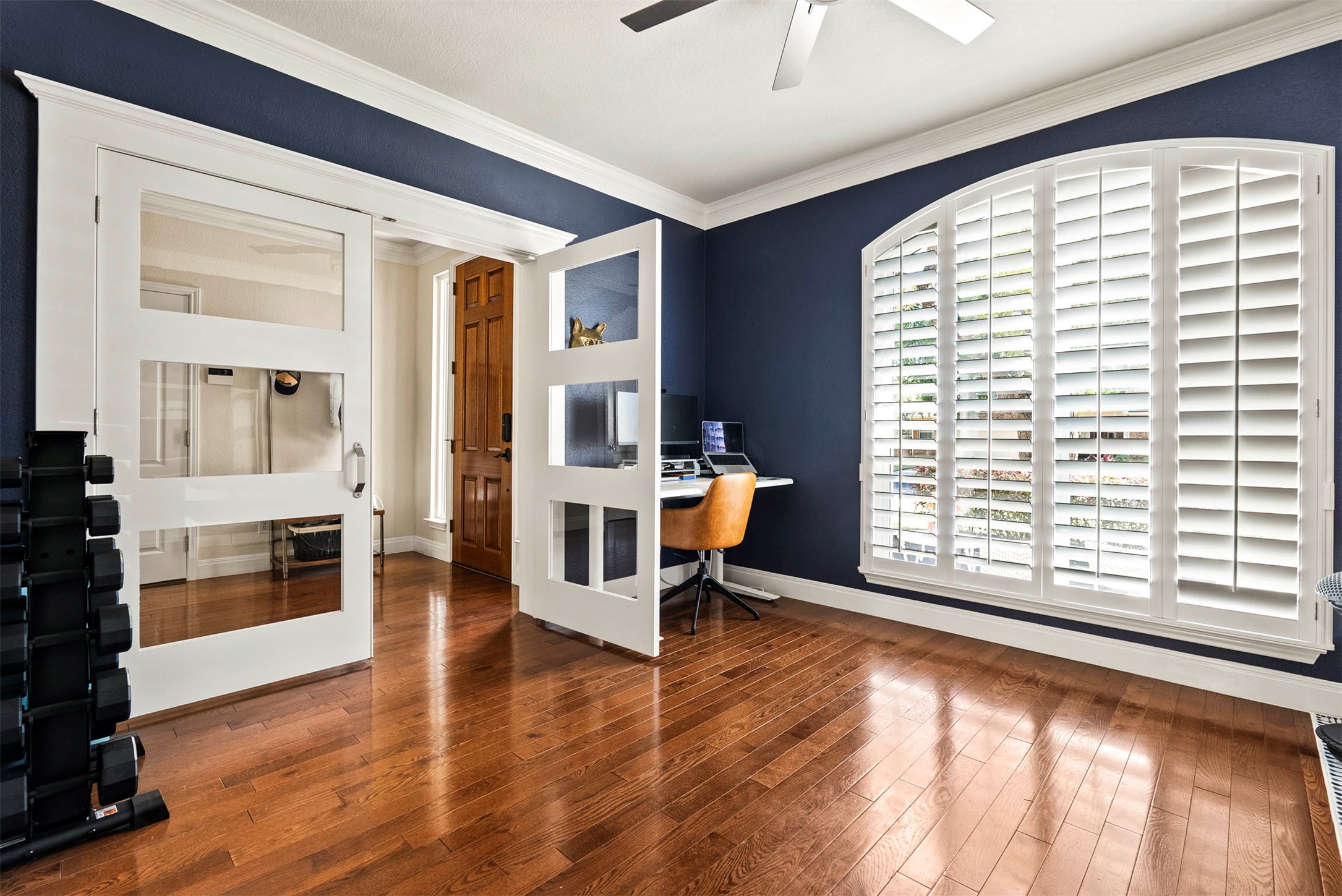 6720 Hansa Loop Austin, TX 78739 - Photo 4 of 38 Located right off the foyer, the dedicated office offers a quiet spot for work or a library