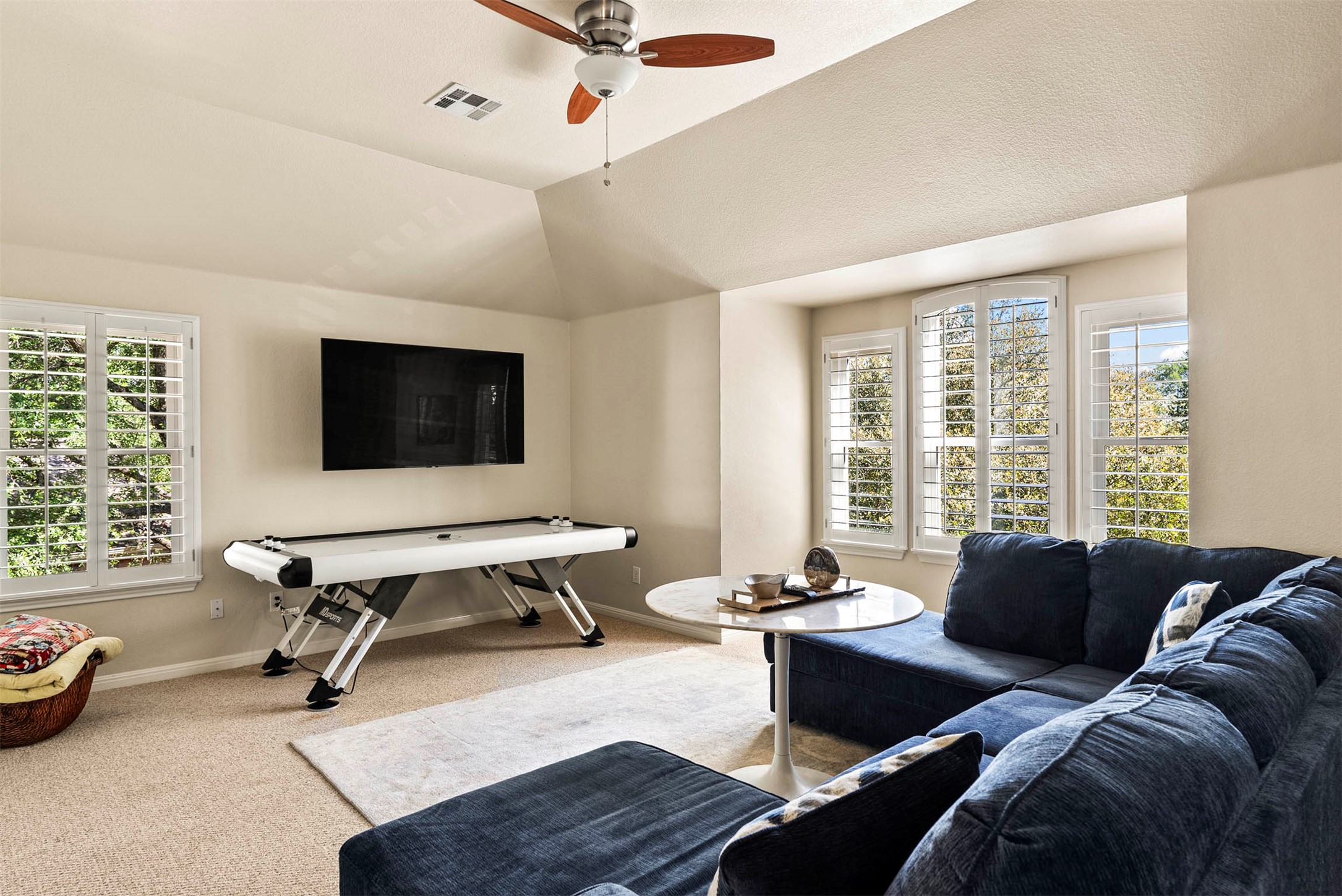 6720 Hansa Loop Austin, TX 78739 - Photo 5 of 38 The second-floor living area is a flexible space, perfect for movie nights or a secondary lounge