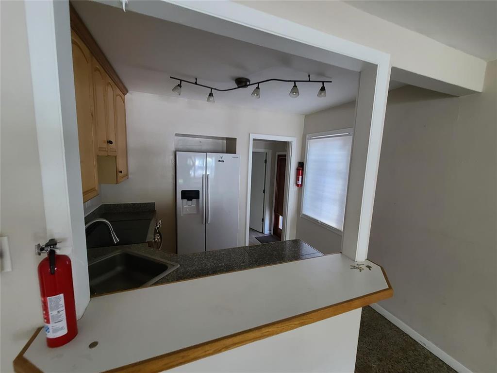 904 Southeast 13th Street Fort Lauderdale, FL 33316 - Photo 8 of 11 a view of a hallway with front door
