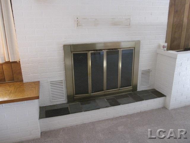 3666 Country Club Road Adrian, MI 49221 - Photo 14 of 32 Family Room fireplace