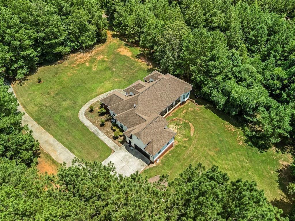 166 Freedom Lane Commerce, GA 30530 - Photo 23 of 25 an aerial view of a house with a yard and swimming pool