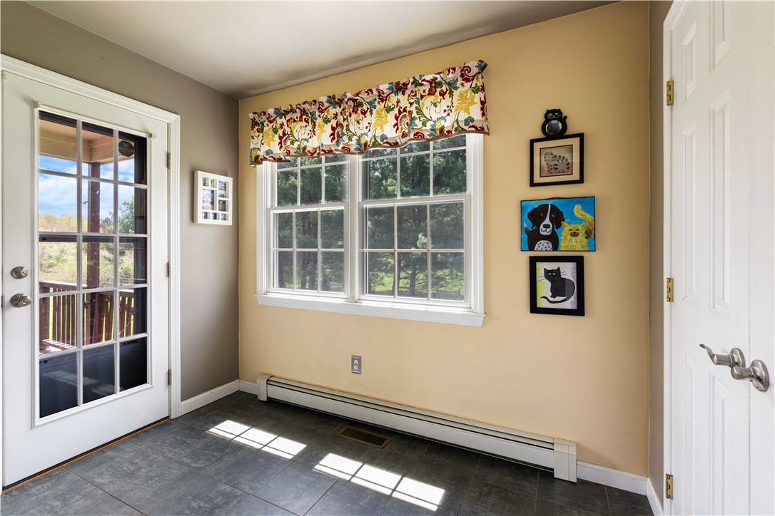5 Victoria Lane Rehoboth, MA 02769 - Photo 16 of 48 Located off the kitchen is the mudroom with access to deck.