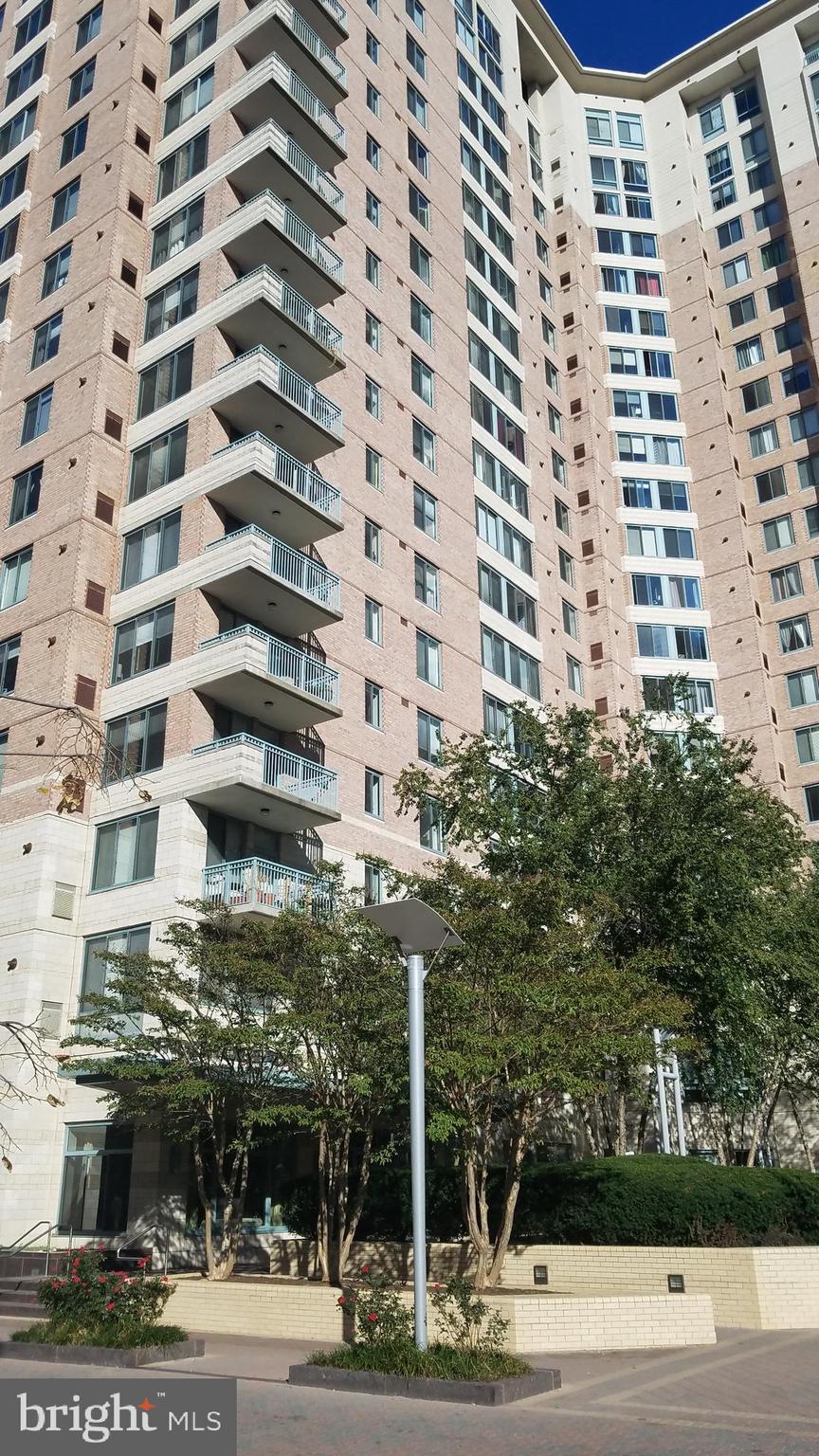 a view of a building with a street