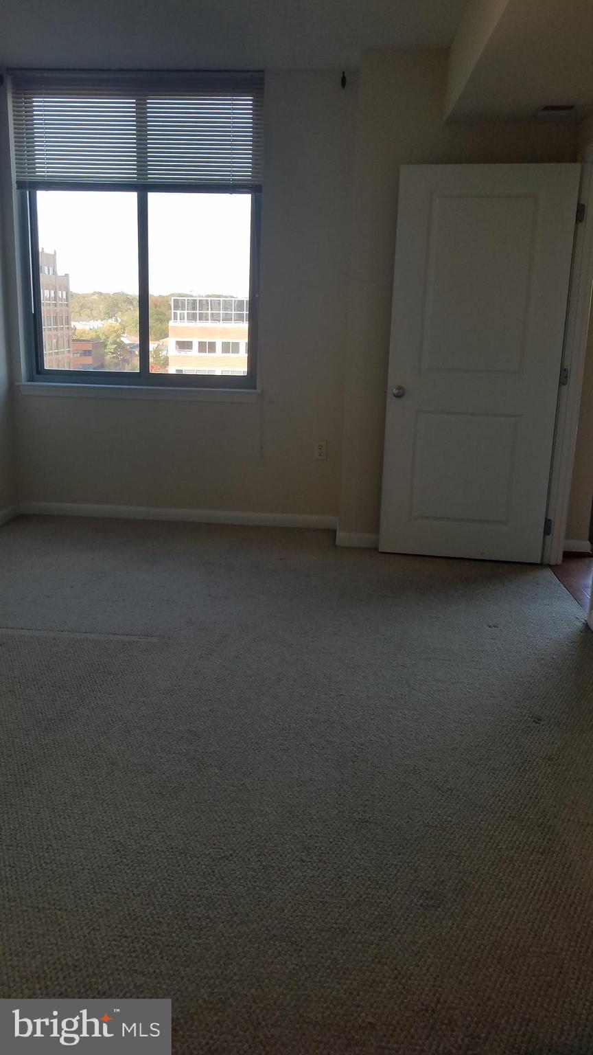 851 North Glebe Road, Unit 1015 Arlington, VA 22203 - Photo 14 of 29 a view of an empty room and window