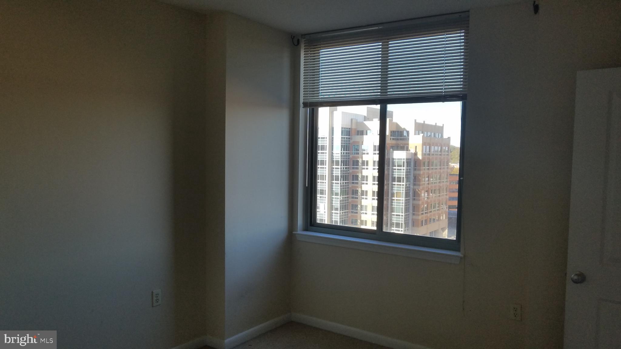 851 North Glebe Road, Unit 1015 Arlington, VA 22203 - Photo 15 of 29 a view of an empty room with a window