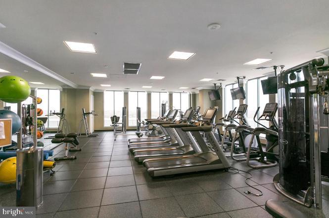851 North Glebe Road, Unit 1015 Arlington, VA 22203 - Photo 23 of 29 a view of a room with gym equipment