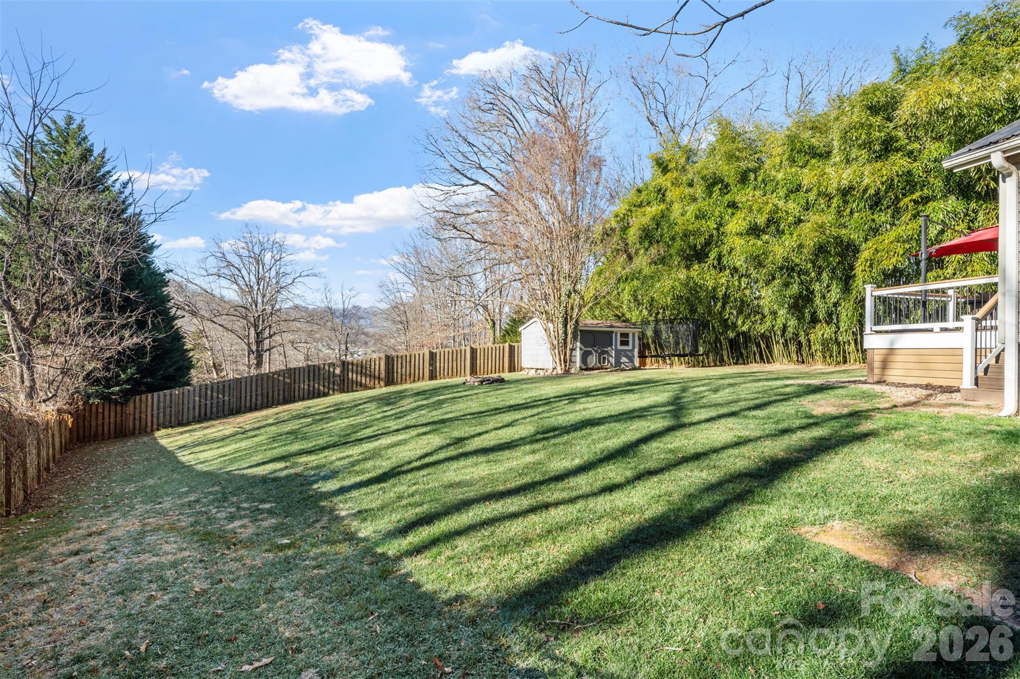 32 Youngs Cove Road Candler, NC 28715 - Photo 30 of 35 a view of a house with a yard