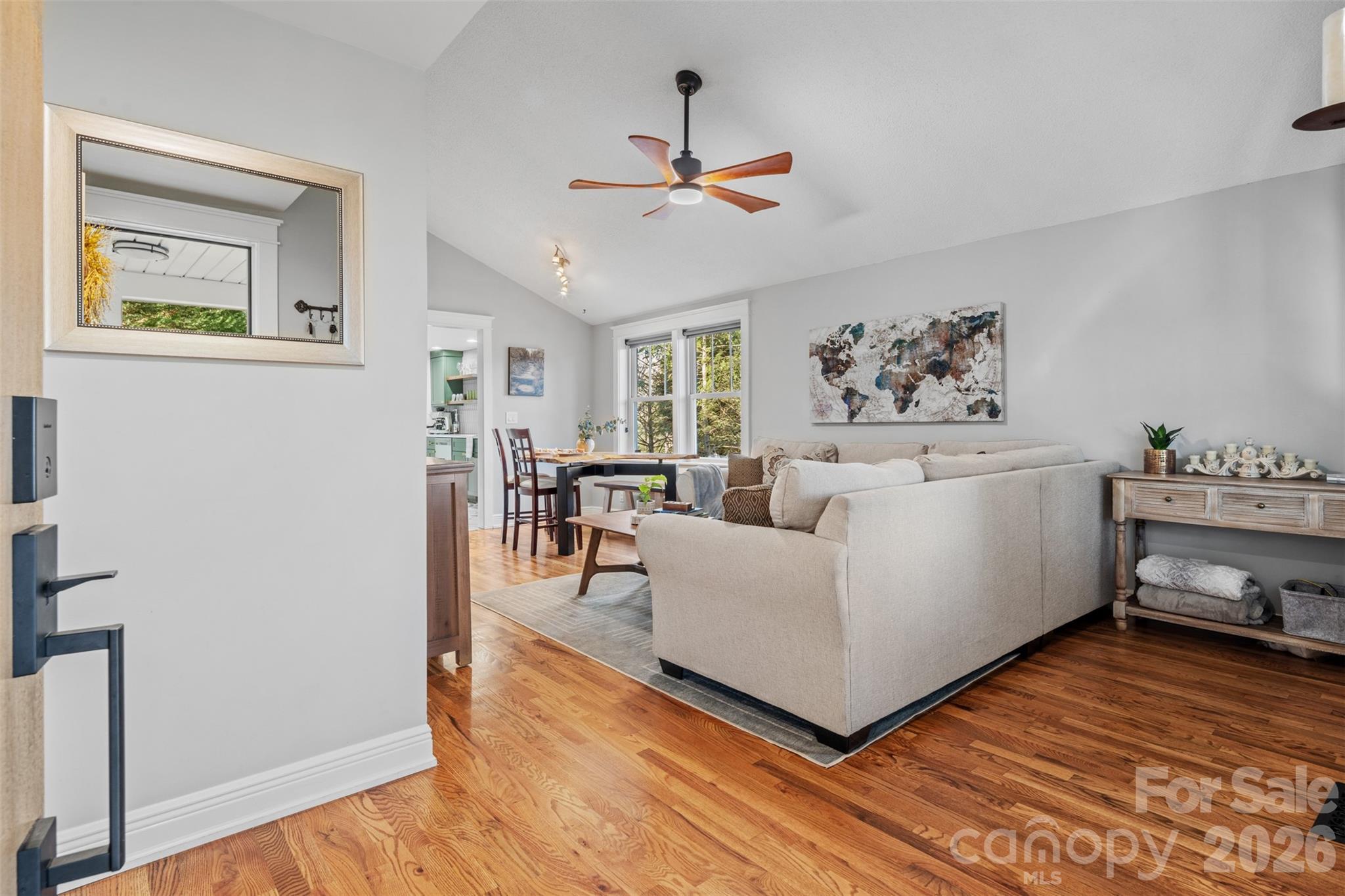 32 Youngs Cove Road Candler, NC 28715 - Photo 3 of 35 a living room with furniture and a wooden floor
