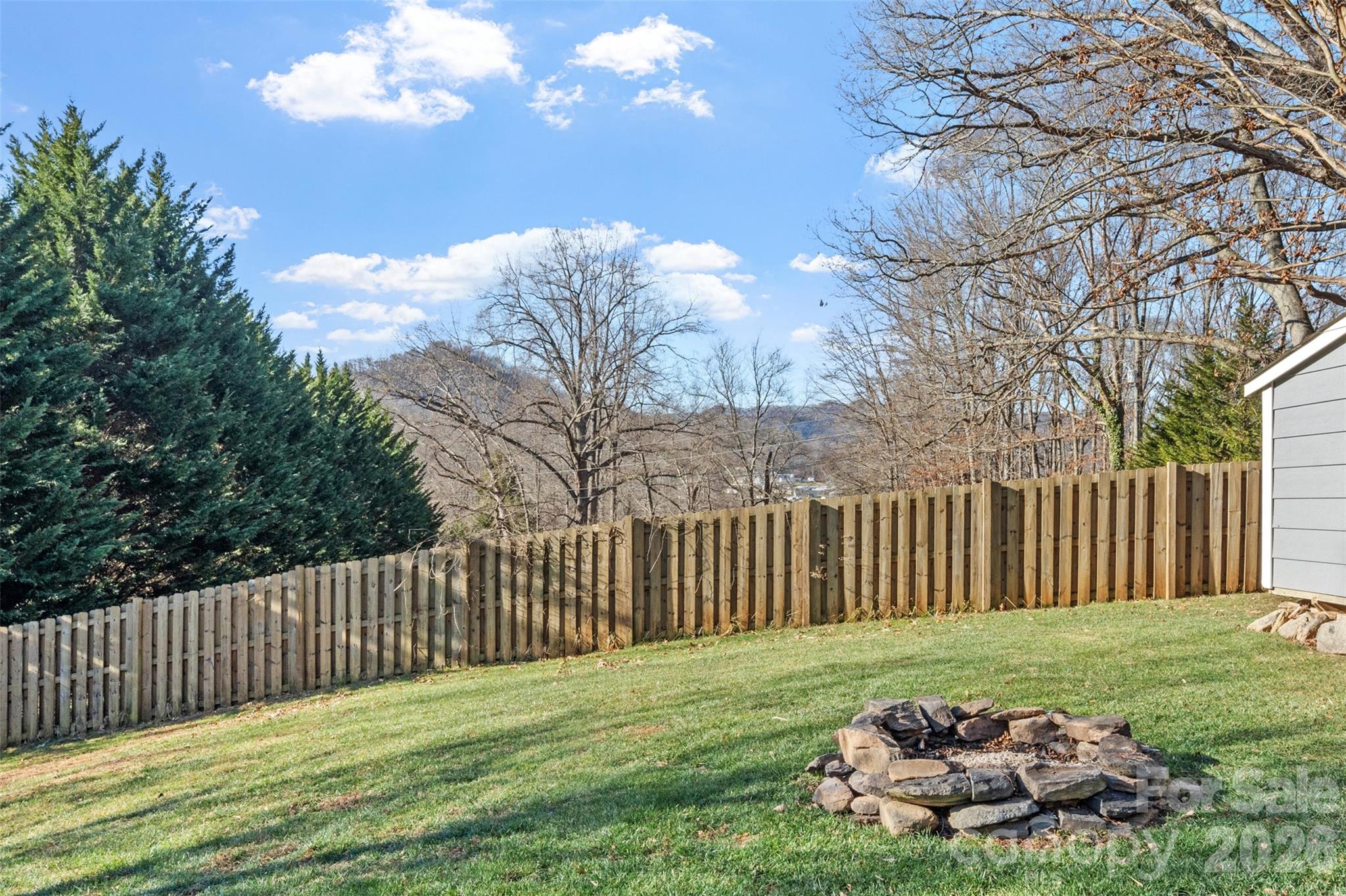 32 Youngs Cove Road Candler, NC 28715 - Photo 31 of 35 a view of a porch with a fence
