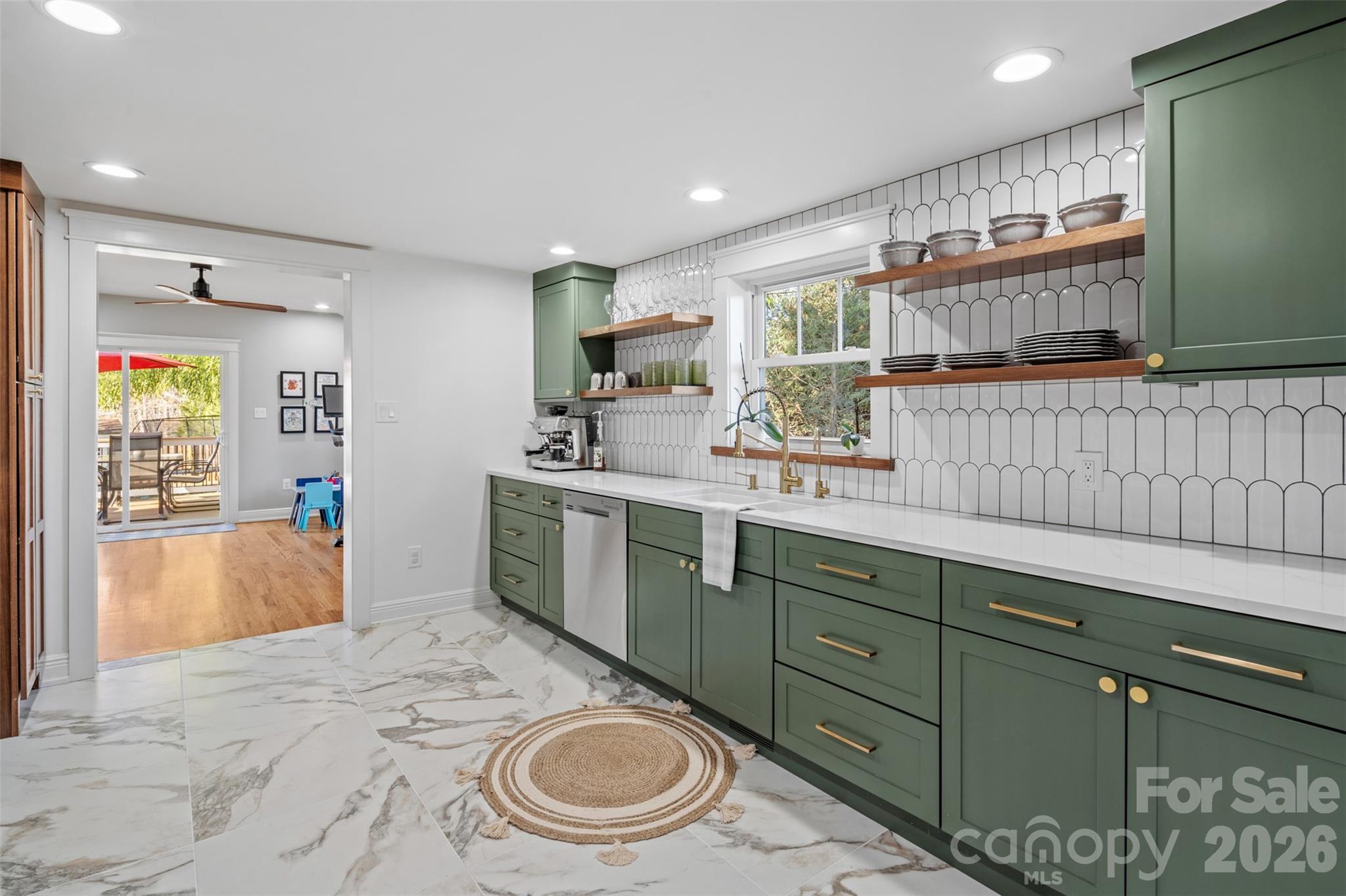 32 Youngs Cove Road Candler, NC 28715 - Photo 8 of 35 a room with counter top space and two mirrors