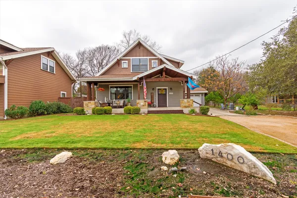 a front view of a house with swimming pool