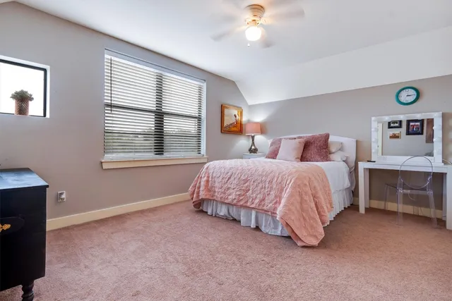 a hallway with washer and dryer