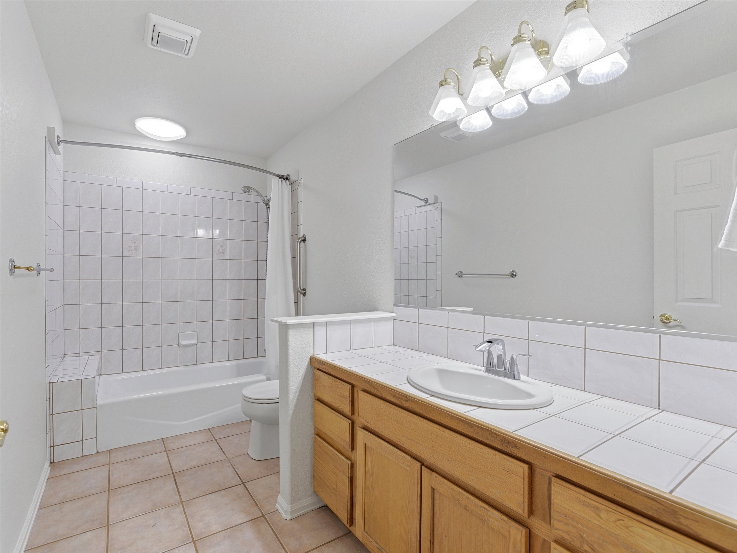 3082 Shadowbrook Court Grand Junction, CO 81504 - Photo 19 of 28 a bathroom with a sink a toilet and shower