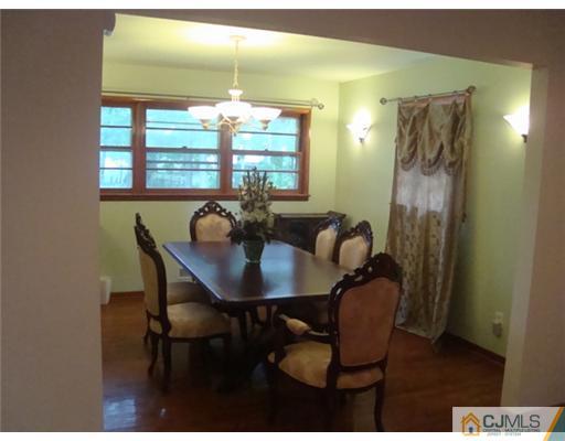 11 Huntington Road Edison, NJ 08820 - Photo 5 of 8 a view of a dining room with furniture and window