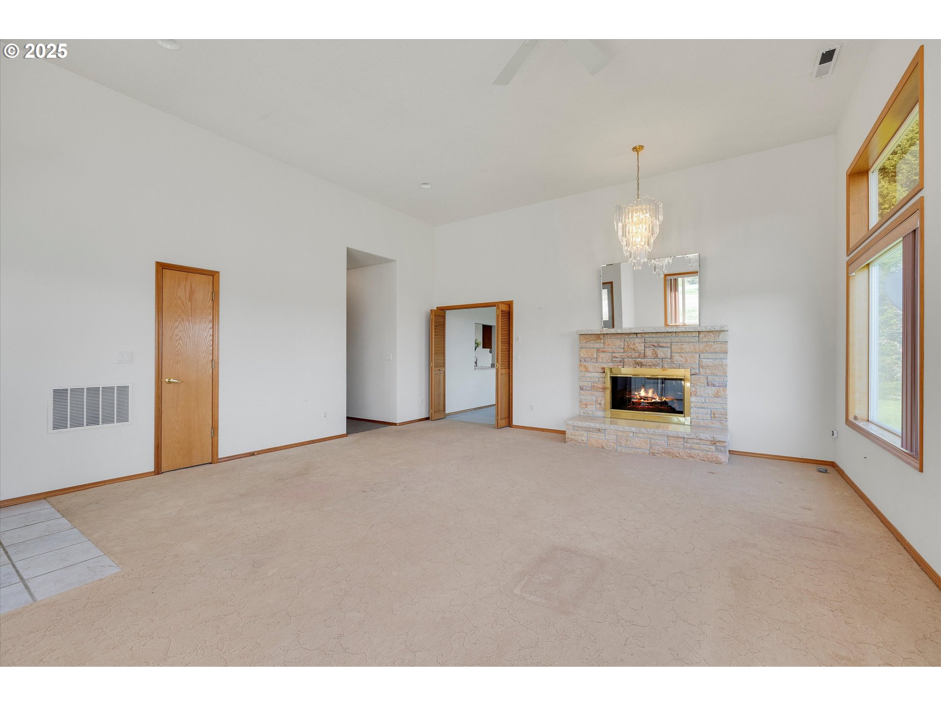 47777 Southwest Ihrig Road Forest Grove, OR 97116 - Photo 20 of 47 a view of empty room with fireplace and window