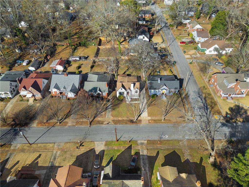 1639 Stokes Avenue Southwest Atlanta, GA 30310 - Photo 55 of 56 an aerial view of multiple houses with yard