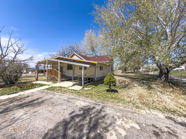 2454 East Old Wellington Road Price, UT 84501 - Photo 27 of 27 Covered Porch with New Railing