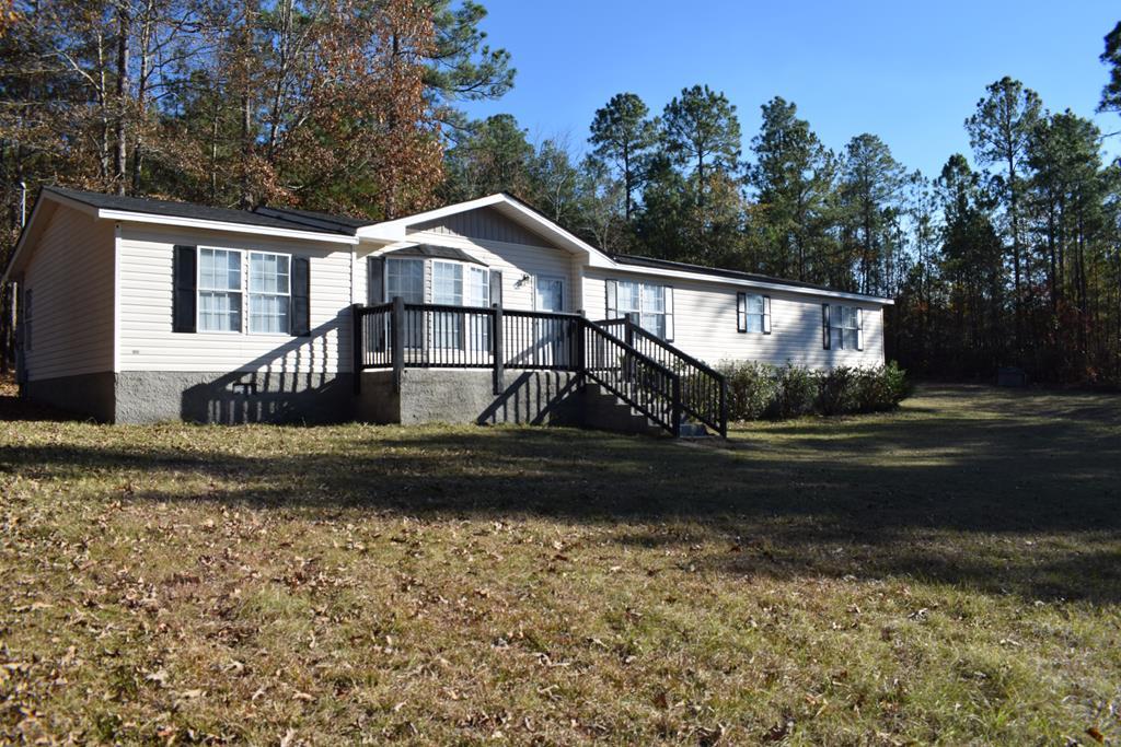 528 Juniper Creek Road Byron, GA 31008 - Photo 1 of 18 a view of a house with a yard