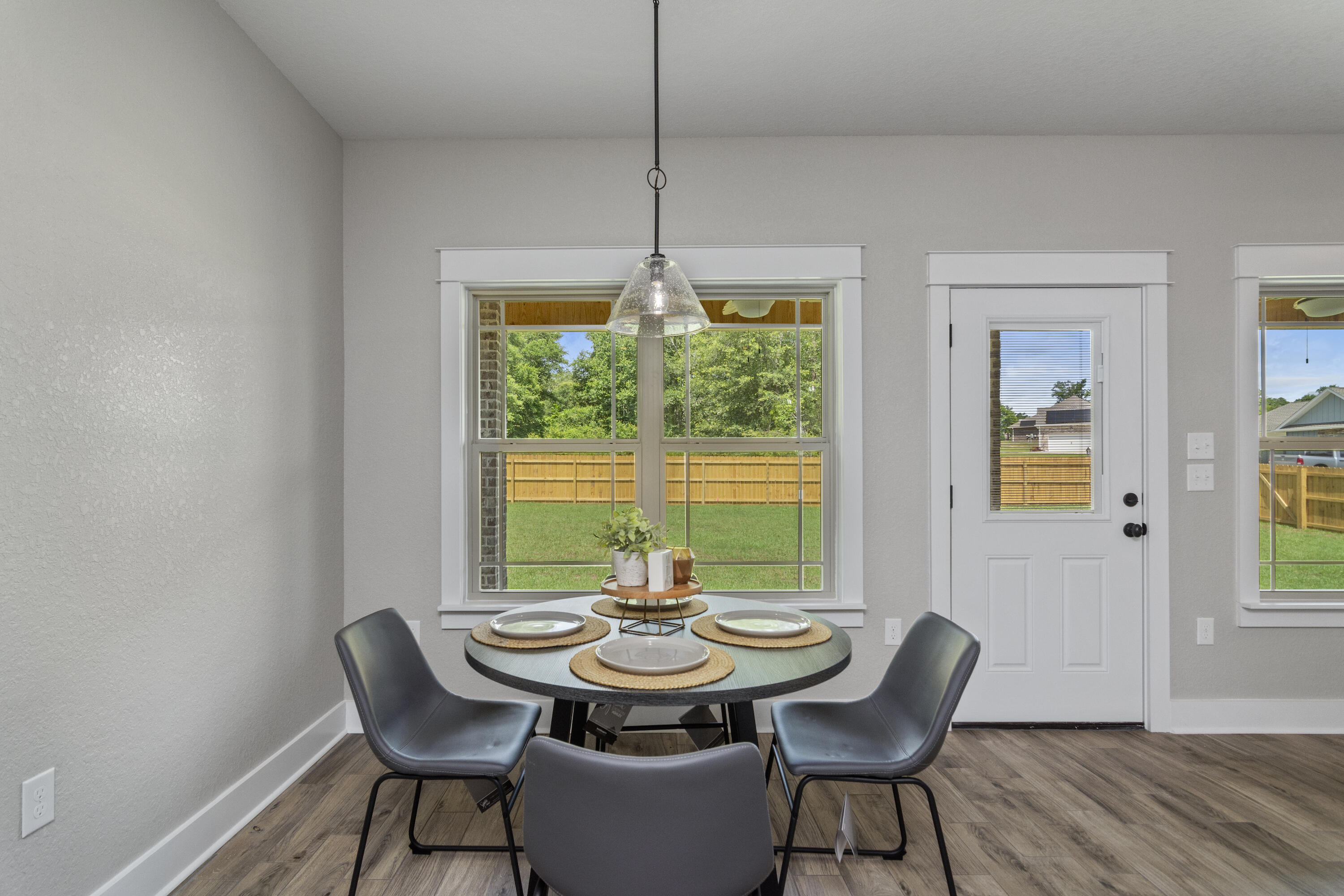 4079 Happy Trails Road Crestview, FL 32539 - Photo 9 of 27 a view of a dining room with furniture window and outside view