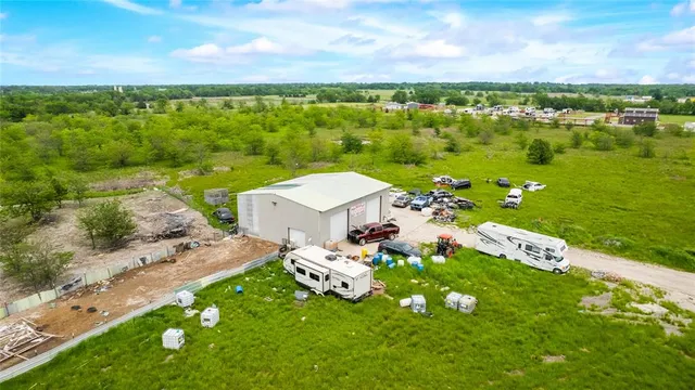 a view of a garden with houses