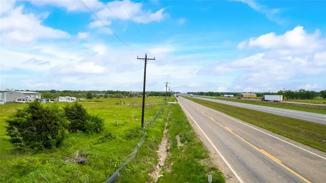 a view of a garden with a lake view