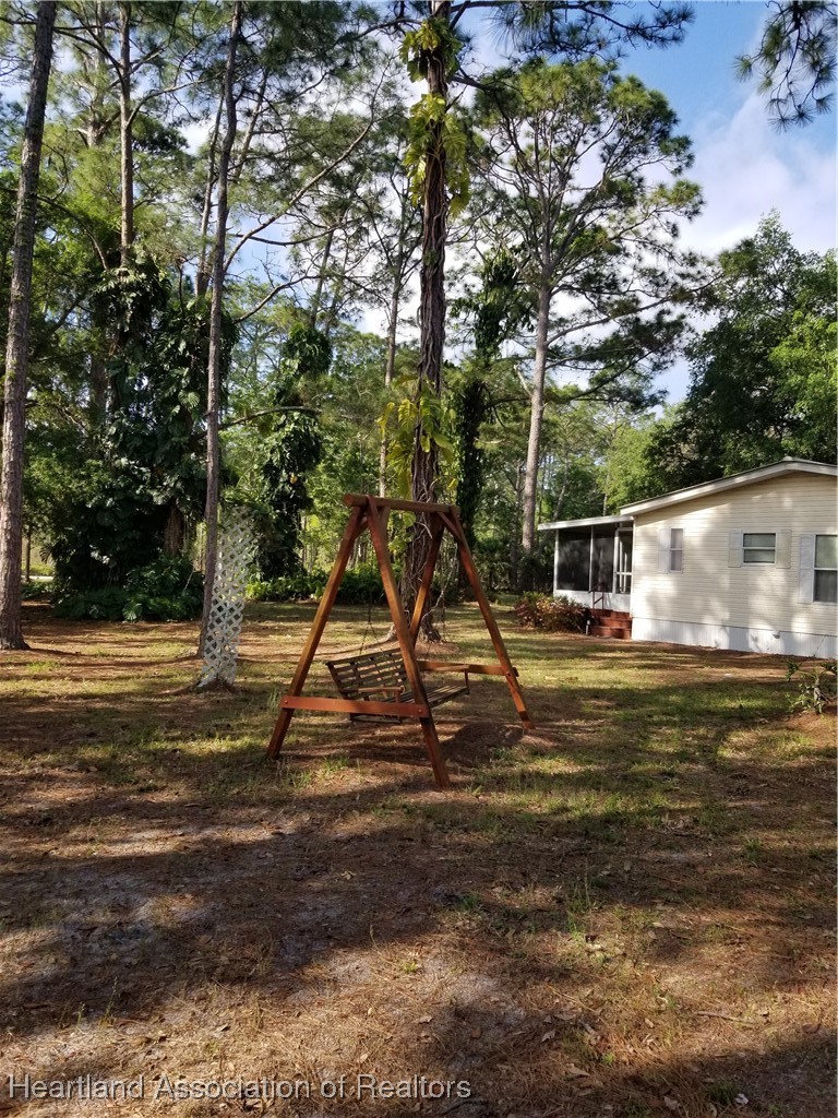 9125 Spur Path Sebring, FL 33875 - Photo 28 of 31 Swing